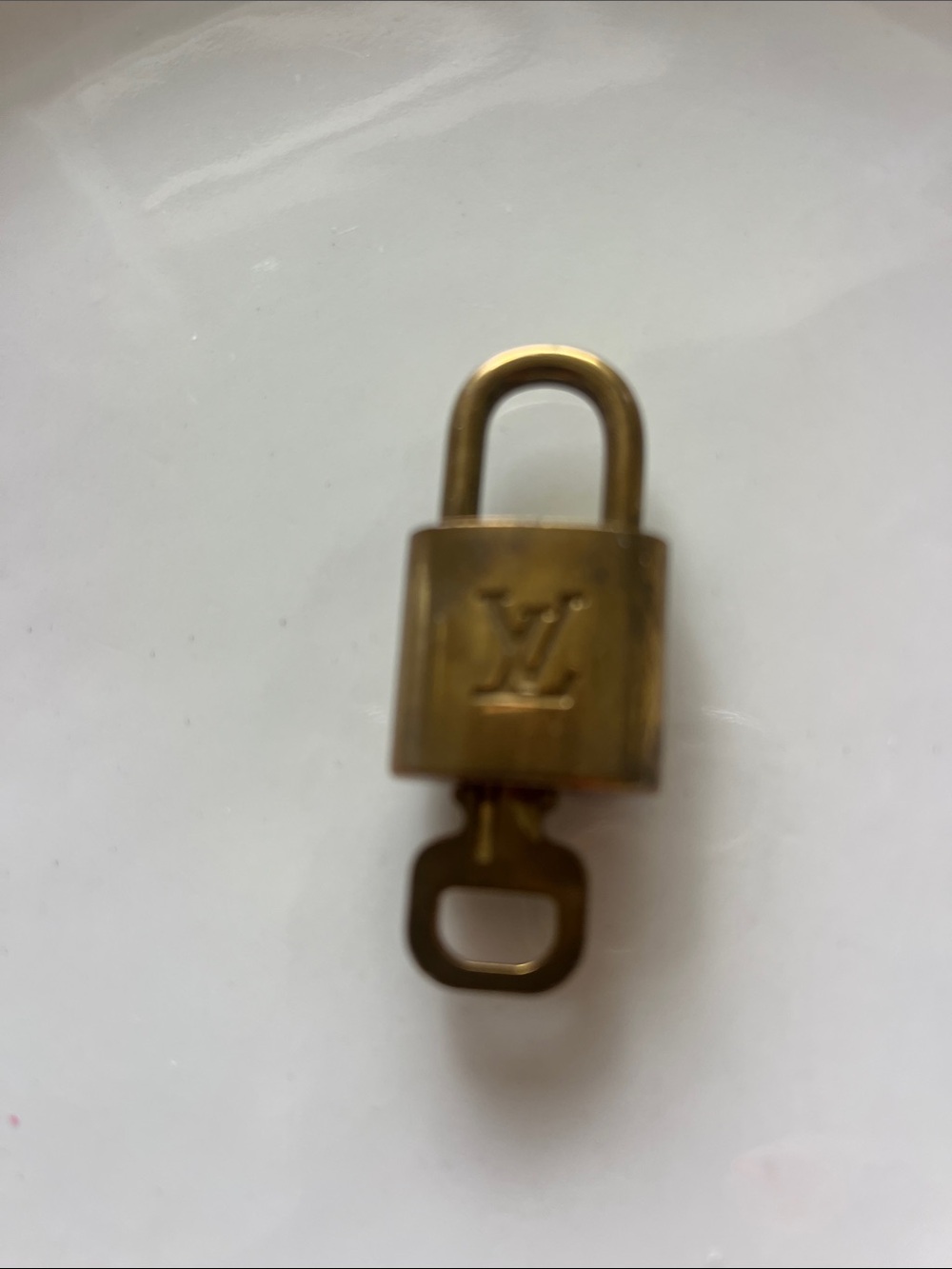 Authentic Louis Vuitton padlock and key